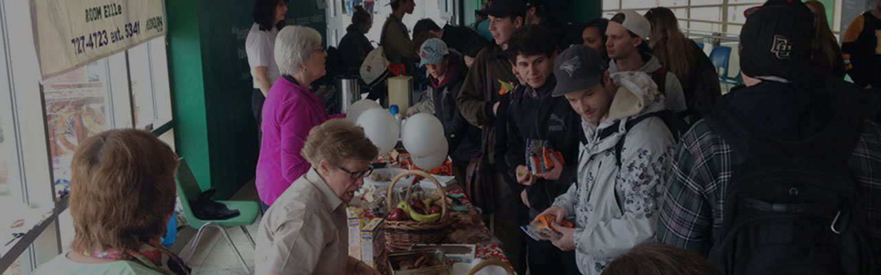 Members of the Barrhaven Church serve food to students at Algonquin College during exams.