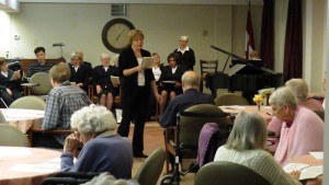 Hymn sing with the group of retirement home residents.