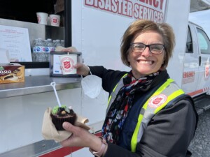 EDS Coordinator Holds cupcake