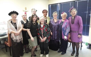 Ladies gathered at a women's fellowship tea